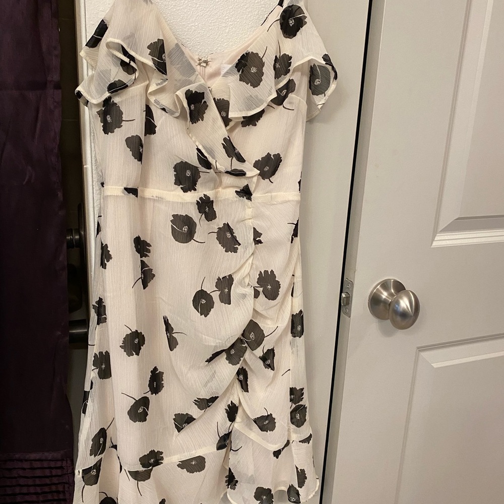 White floral sundress. Never worn! New with tags, perfect summer dress.